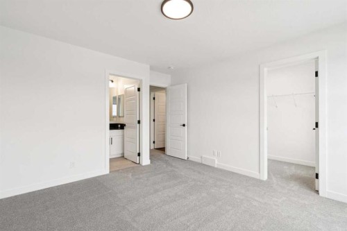 283 Dawson Wharf Rise, Chestermere, AB - Indoor Photo Showing Other Room