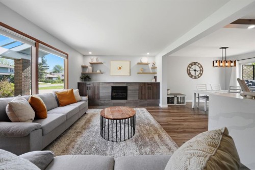 75 Hill Crescent, Red Deer, AB - Indoor Photo Showing Living Room With Fireplace