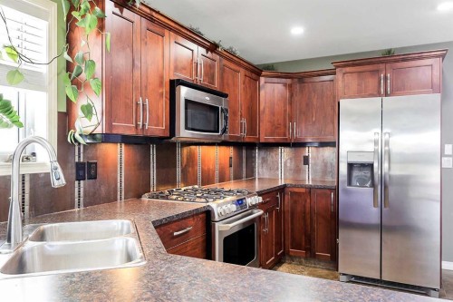 284 Vanson Close, Red Deer, AB - Indoor Photo Showing Kitchen With Double Sink With Upgraded Kitchen