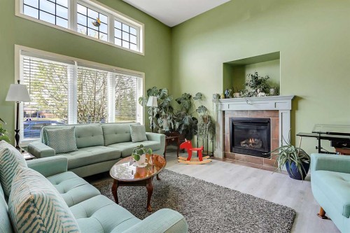 284 Vanson Close, Red Deer, AB - Indoor Photo Showing Living Room With Fireplace