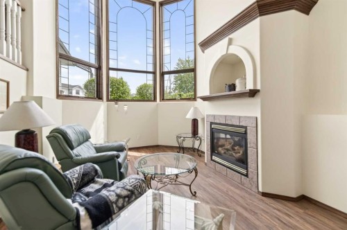 25 Fern Glade Crescent, Sylvan Lake, AB - Indoor Photo Showing Other Room With Fireplace