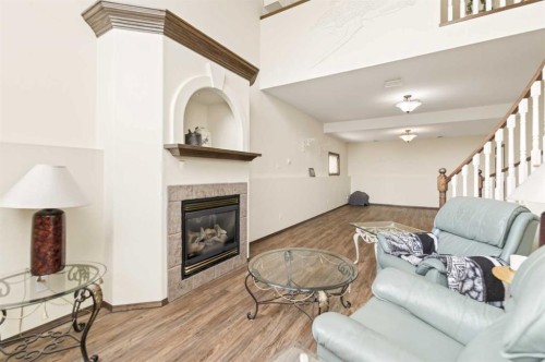 25 Fern Glade Crescent, Sylvan Lake, AB - Indoor With Fireplace