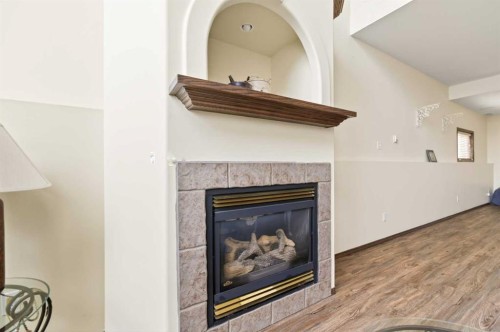 25 Fern Glade Crescent, Sylvan Lake, AB - Indoor Photo Showing Living Room With Fireplace