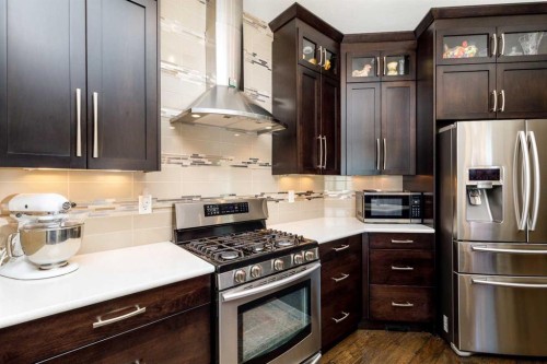 39 Thompson Crescent, Red Deer, AB - Indoor Photo Showing Kitchen With Stainless Steel Kitchen With Upgraded Kitchen