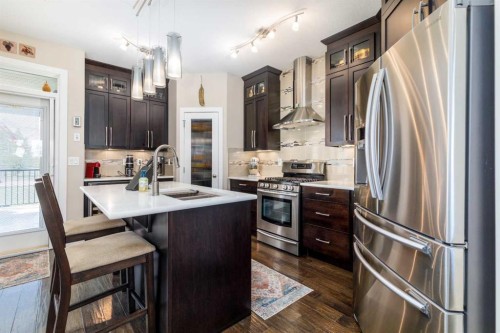 39 Thompson Crescent, Red Deer, AB - Indoor Photo Showing Kitchen With Stainless Steel Kitchen With Double Sink With Upgraded Kitchen