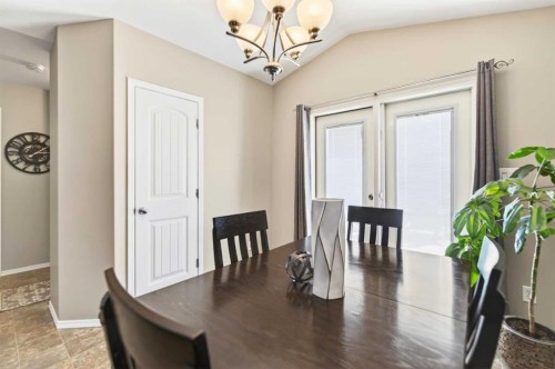 32 Reynolds Road, Sylvan Lake, AB - Indoor Photo Showing Dining Room