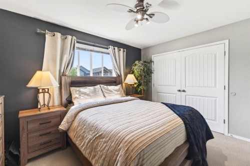 32 Reynolds Road, Sylvan Lake, AB - Indoor Photo Showing Bedroom