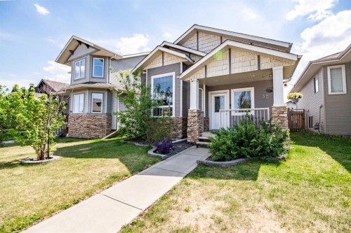 32 Reynolds Road, Sylvan Lake, AB - Outdoor With Facade
