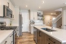 71 Bardwell Way, Sylvan Lake, AB  - Indoor Photo Showing Kitchen With Double Sink With Upgraded Kitchen 