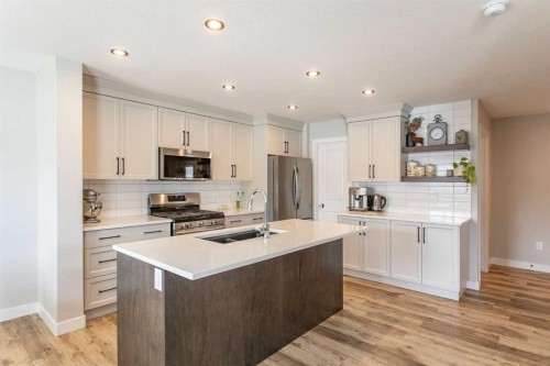 71 Bardwell Way, Sylvan Lake, AB - Indoor Photo Showing Kitchen With Double Sink With Upgraded Kitchen