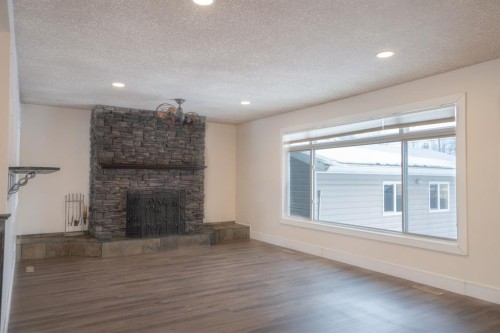 3 Montcalm Avenue, Camrose, AB - Indoor With Fireplace