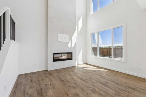 73 Sora Gate Se, Calgary, AB - Indoor With Fireplace