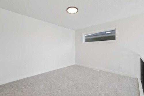 73 Sora Gate Se, Calgary, AB - Indoor Photo Showing Other Room