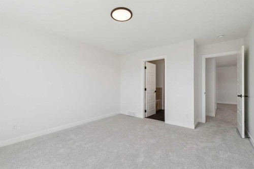 73 Sora Gate Se, Calgary, AB - Indoor Photo Showing Other Room