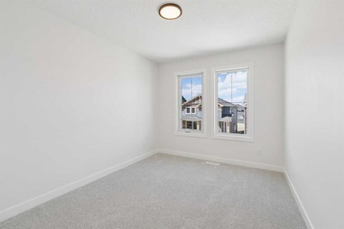 73 Sora Gate Se, Calgary, AB - Indoor Photo Showing Other Room