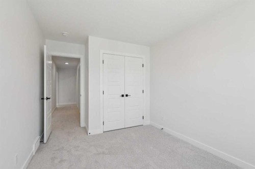 73 Sora Gate Se, Calgary, AB - Indoor Photo Showing Other Room