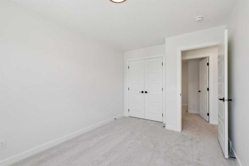 73 Sora Gate Se, Calgary, AB - Indoor Photo Showing Other Room