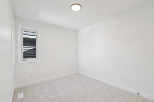 73 Sora Gate Se, Calgary, AB - Indoor Photo Showing Other Room