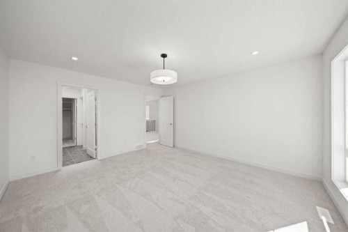 83 Heritage Manor, Cochrane, AB - Indoor Photo Showing Other Room