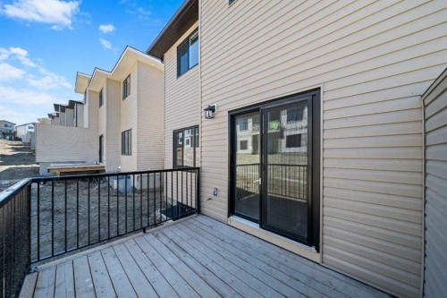 83 Heritage Manor, Cochrane, AB - Outdoor With Exterior