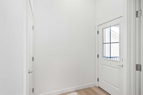 83 Heritage Manor, Cochrane, AB - Indoor Photo Showing Other Room