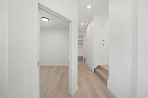 83 Heritage Manor, Cochrane, AB - Indoor Photo Showing Other Room