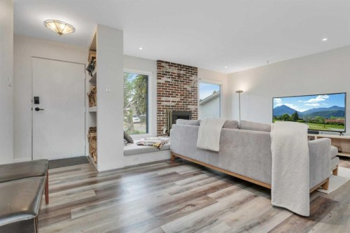 31 Macfarlane Avenue, Red Deer, AB - Indoor Photo Showing Living Room With Fireplace