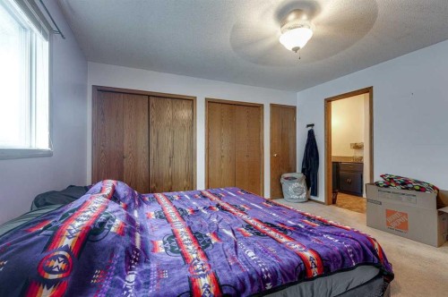 24 Bruns Bay, Lacombe, AB - Indoor Photo Showing Bedroom