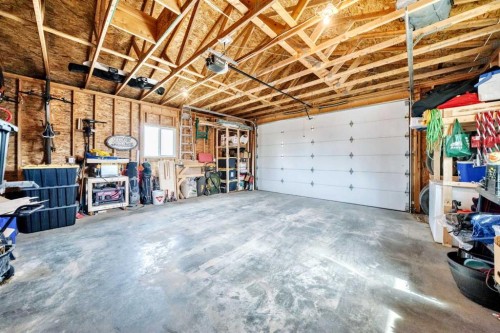 128 Almond Crescent, Blackfalds, AB - Indoor Photo Showing Garage