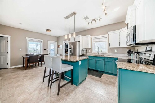 128 Almond Crescent, Blackfalds, AB - Indoor Photo Showing Kitchen With Upgraded Kitchen