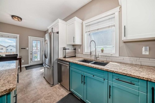 128 Almond Crescent, Blackfalds, AB - Indoor Photo Showing Kitchen With Double Sink