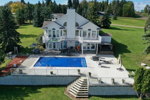 205-1 Ave Avenue West, Buck Lake, AB - Outdoor With In Ground Pool With Deck Patio Veranda With Backyard
