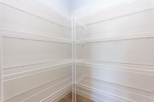 60 Trinity Street, Lacombe, AB - Indoor With Storage