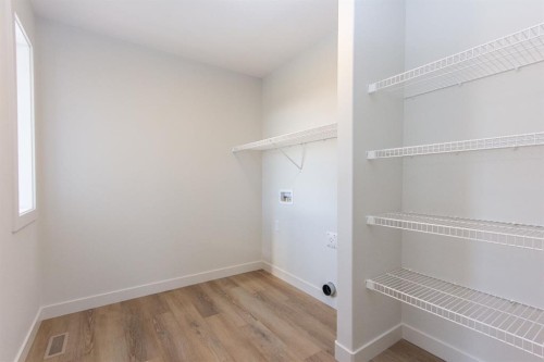 60 Trinity Street, Lacombe, AB - Indoor With Storage