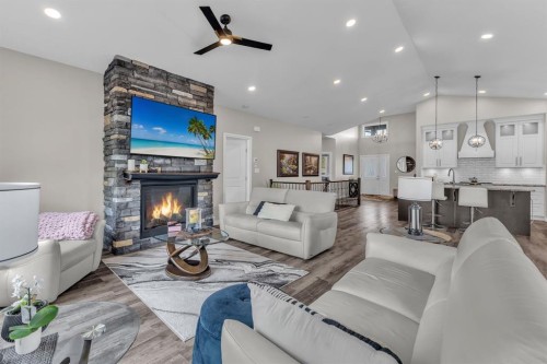 5052 Lakeshore Drive, Sylvan Lake, AB - Indoor Photo Showing Living Room With Fireplace