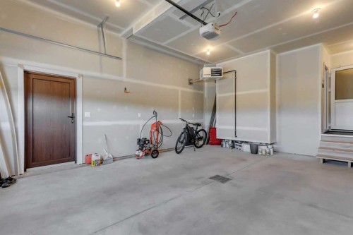 18 Athens Place, Blackfalds, AB - Indoor Photo Showing Garage
