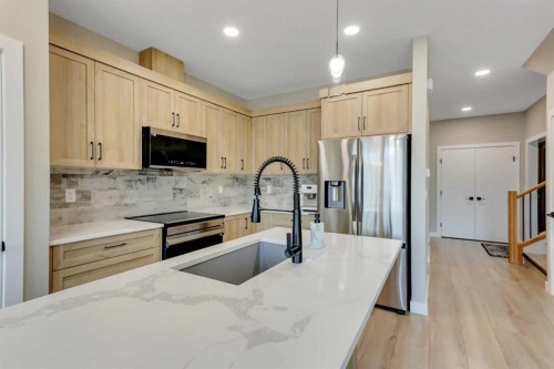 18 Athens Place, Blackfalds, AB - Indoor Photo Showing Kitchen With Stainless Steel Kitchen With Upgraded Kitchen
