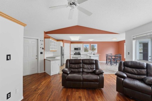 18 Osmond Close, Red Deer, AB - Indoor Photo Showing Living Room With Fireplace