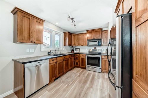 8 Haliburton Crescent, Red Deer, AB - Indoor Photo Showing Kitchen With Stainless Steel Kitchen With Double Sink