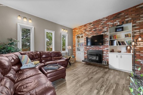 4209 63 Street, Camrose, AB - Indoor Photo Showing Living Room With Fireplace