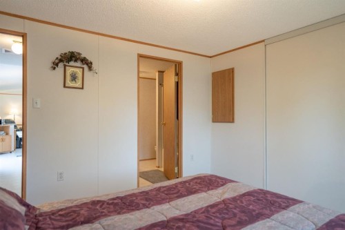 201 433042 Range Road 221, Rural Ponoka County, AB - Indoor Photo Showing Bedroom