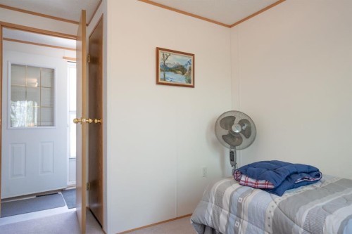 201 433042 Range Road 221, Rural Ponoka County, AB - Indoor Photo Showing Bedroom
