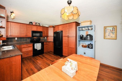 4414 67 Street, Camrose, AB - Indoor Photo Showing Kitchen With Double Sink
