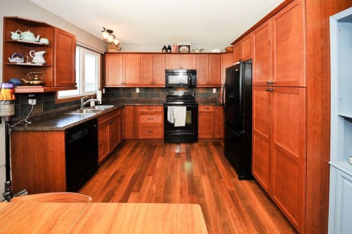 4414 67 Street, Camrose, AB - Indoor Photo Showing Kitchen With Double Sink