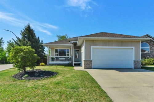 1 Spruce Close, Lacombe, AB - Outdoor With Deck Patio Veranda With Facade