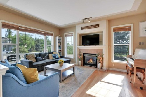 1 Spruce Close, Lacombe, AB - Indoor Photo Showing Living Room With Fireplace