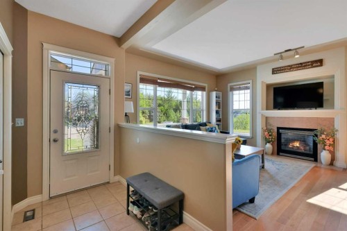 1 Spruce Close, Lacombe, AB - Indoor Photo Showing Living Room With Fireplace