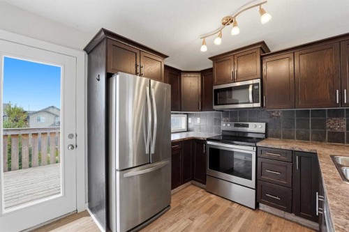 71 Long Close, Red Deer, AB - Indoor Photo Showing Kitchen With Double Sink