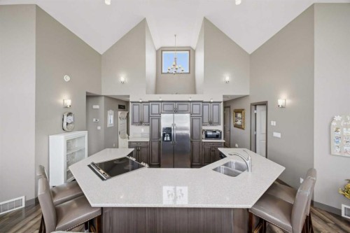 1 Aspen Rise, Parkland Beach, AB - Indoor Photo Showing Kitchen With Double Sink With Upgraded Kitchen