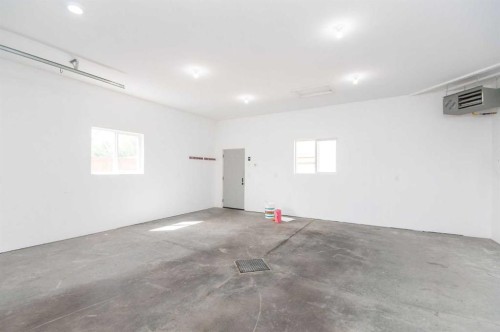 104 Almond Crescent, Blackfalds, AB - Indoor Photo Showing Garage